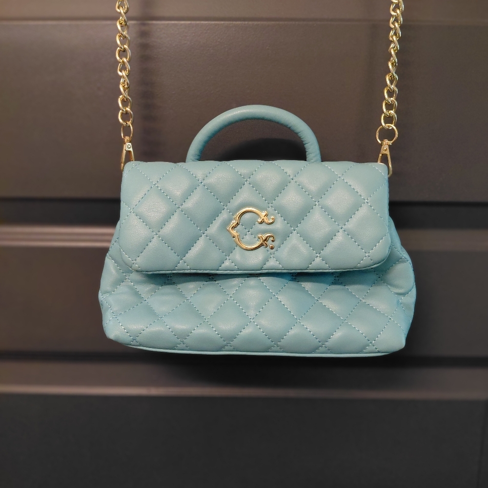 C. Wonder Quilted Light Blue Mini Top-Handle Crossbody with Gold Chain